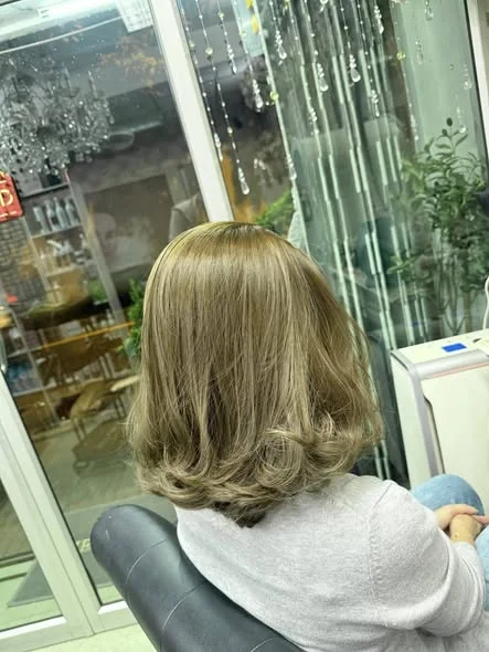 Bold Transformation: Muted Blonde Hair Color in Bangkok