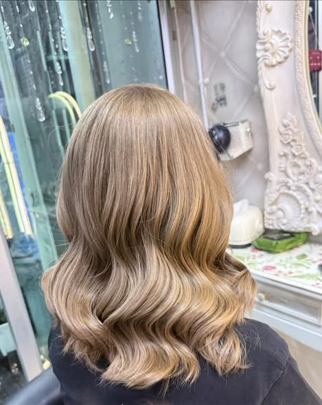 Brighter Muted Beige Blonde Hair in Bangkok