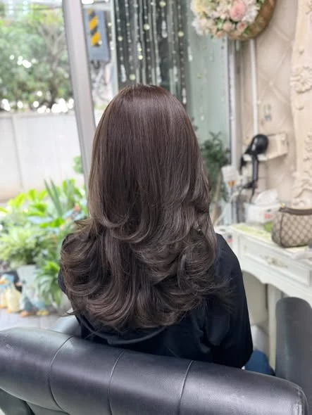 Muted Green-Brown Hair Color Transformation at Oilly Hair Salon Bangkok
