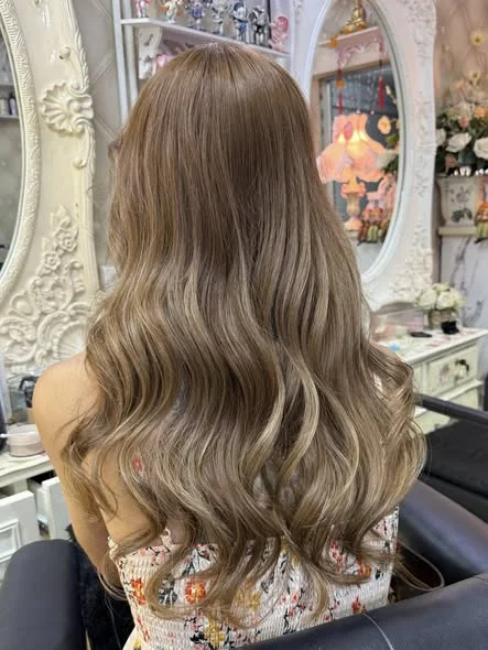 Soft Golden Beige Blonde Transformation at Oilly Hair Salon Bangkok