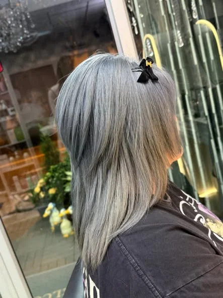 Vibrant Baby Blue Hair Color at Oilly Hair Salon Bangkok
