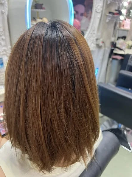 Vibrant Red Hair Color at Oilly Hair Salon Bangkok