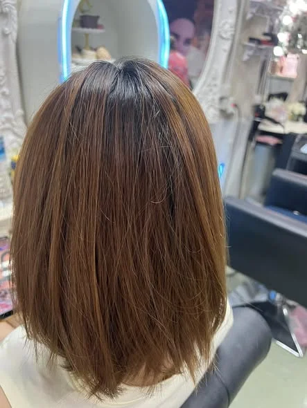 Vibrant Red Hair Color at Oilly Hair Salon Bangkok