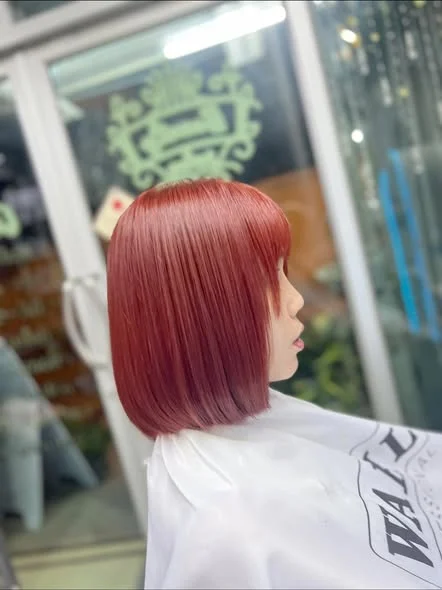 Vibrant Red Hair Color at Oilly Hair Salon Bangkok