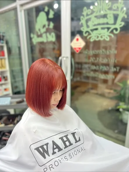 Vibrant Red Hair Color at Oilly Hair Salon Bangkok