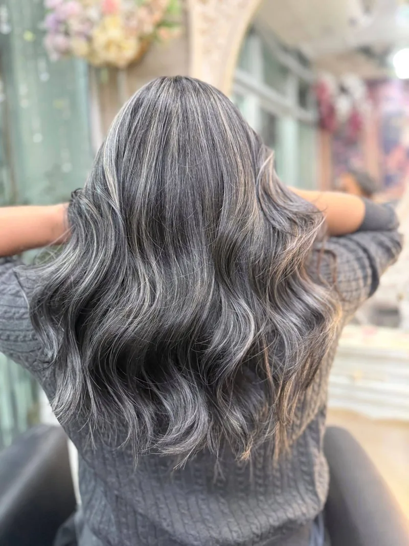 After highlights at Oilly Hair Salon Bangkok - cool ash silver dimensional highlights with glossy S-waves