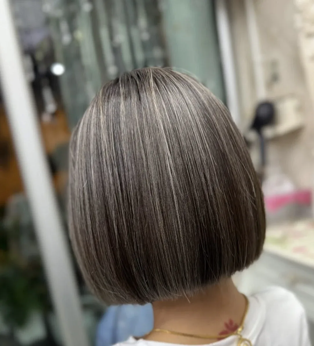 Ash grey toned highlights bob at Oilly Hair Salon Sathorn Bangkok