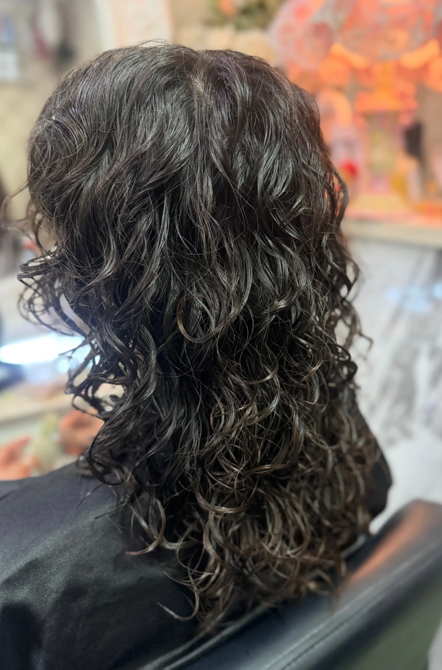 Back view of soft wave cold perm in Bangkok showing natural movement and dimensional curl shape