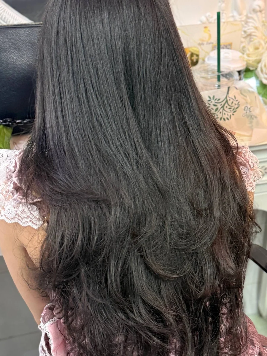 Digital Perm C-Curve after back view at Oilly Hair Salon Bangkok with fuller layered ends