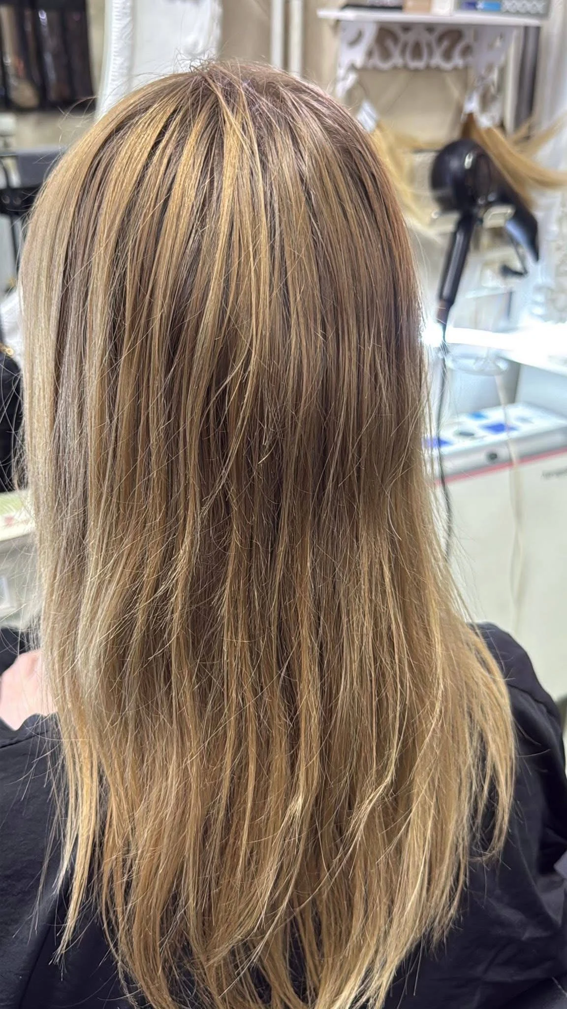 Before low-maintenance balayage in Bangkok with dry fragile hair and warmer uneven blonde pieces