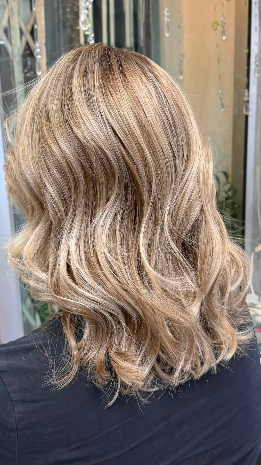 After bright ash blonde balayage with soft dimensional lines and movement at Oilly Hair Salon Bangkok