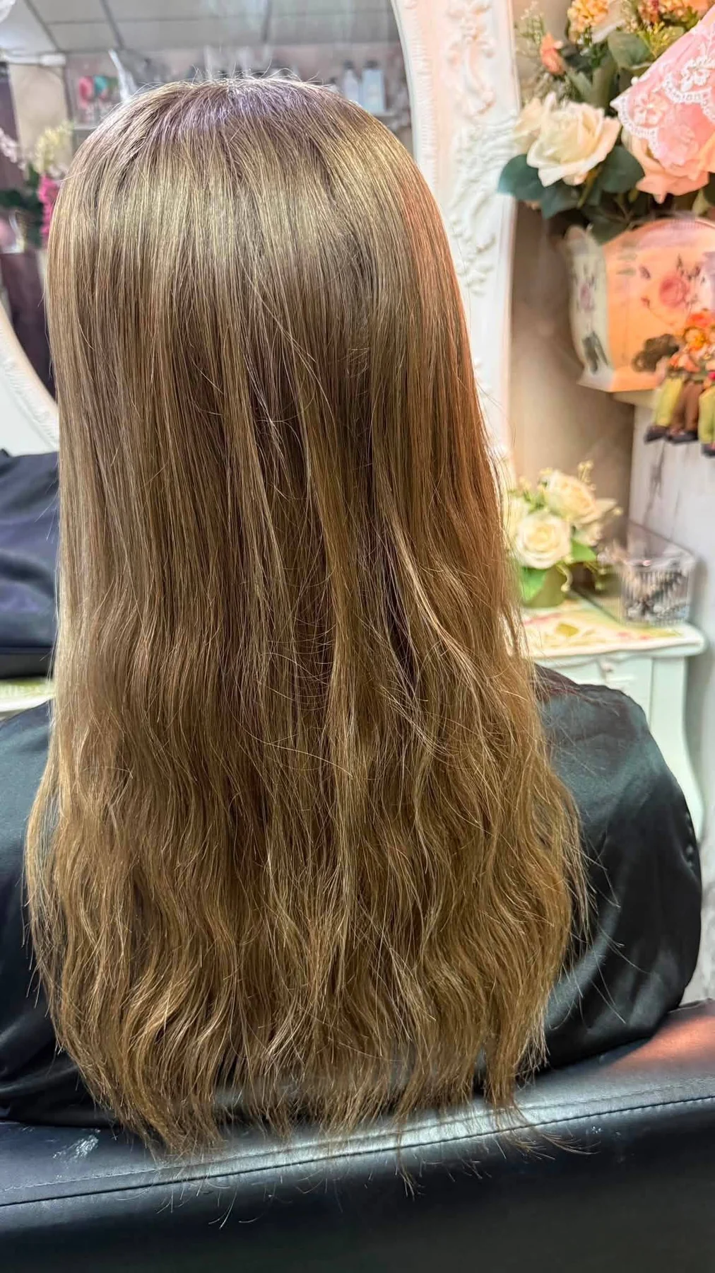 Before bright ash blonde balayage in Bangkok with warmer darker blonde hair before dimensional color design