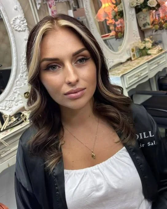 Soft face-framing Money Piece with a brown Balayage color correction at Oilly Hair Salon Bangkok