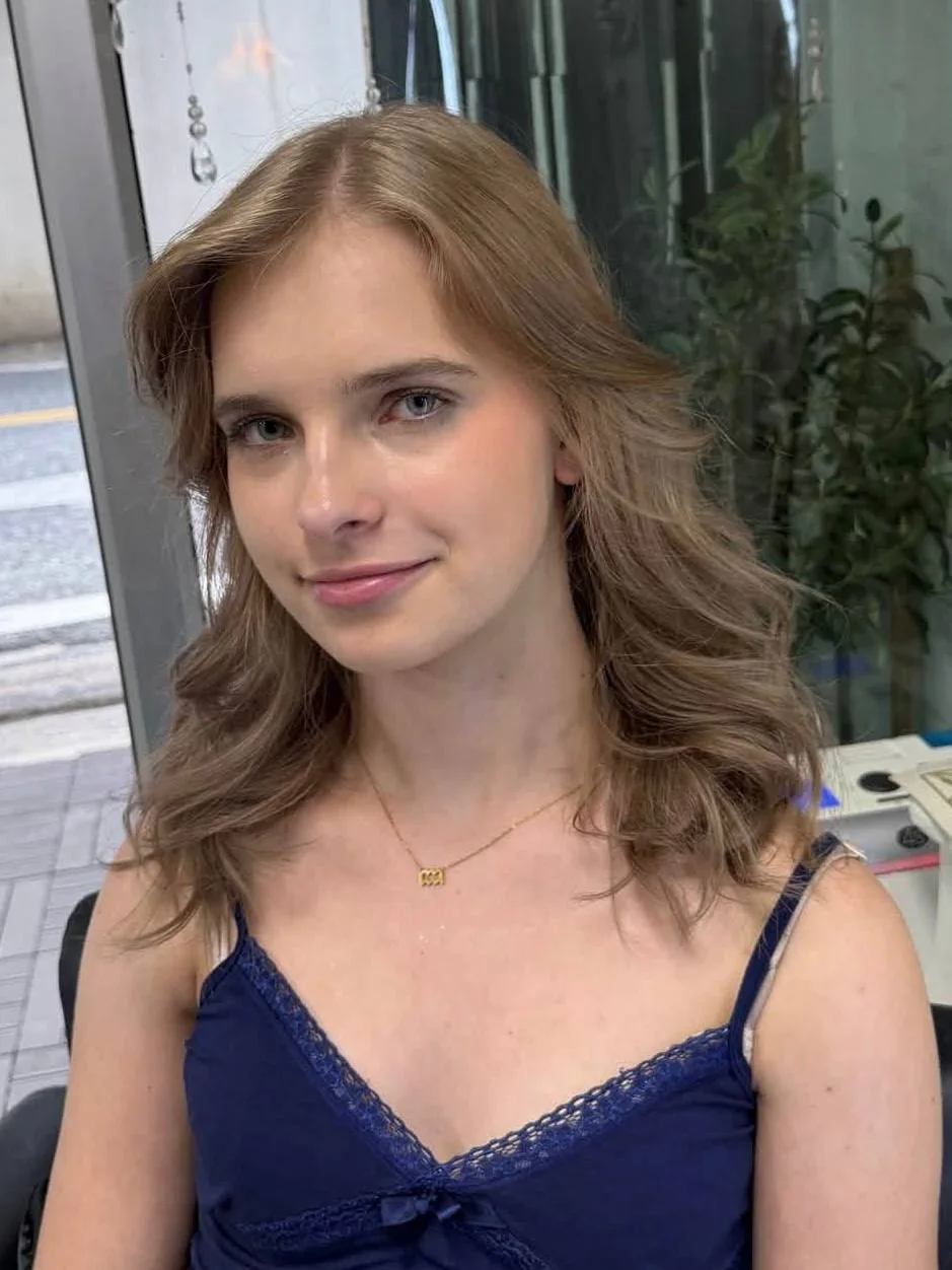 Front view of no-bleach muted chocolate blonde color blending at Oilly Hair Salon Bangkok