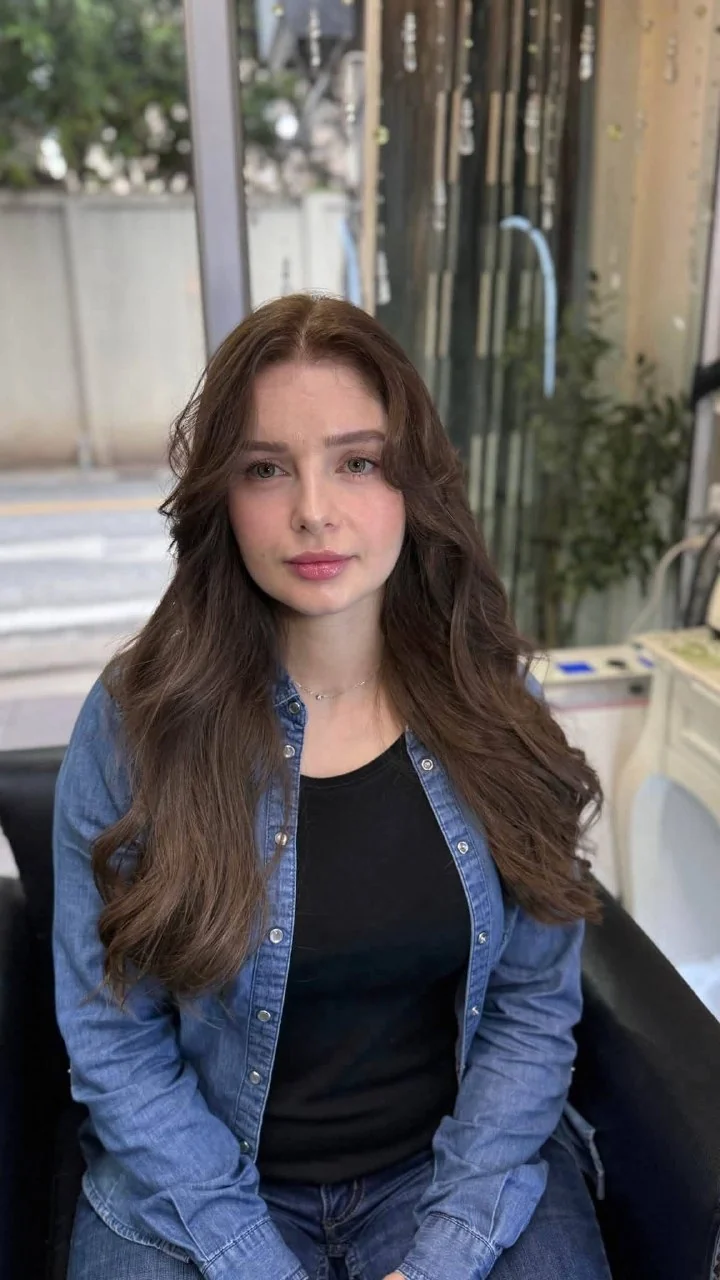 No-bleach ombre grey coverage after front view on European hair at Oilly Hair Salon Bangkok