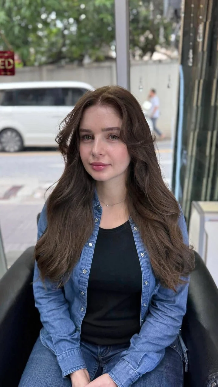 Soft cool brunette no-bleach ombre after front angle for grey coverage in Bangkok