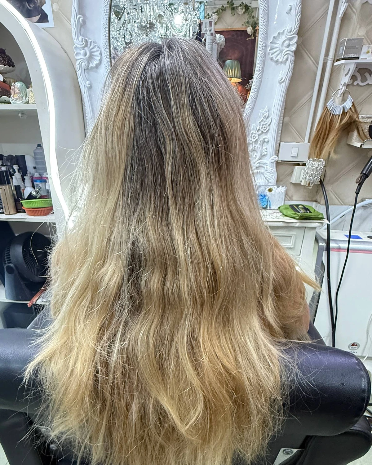 Before off-root Baby Highlights showing blonde lengths with visible darker and grey regrowth in Bangkok