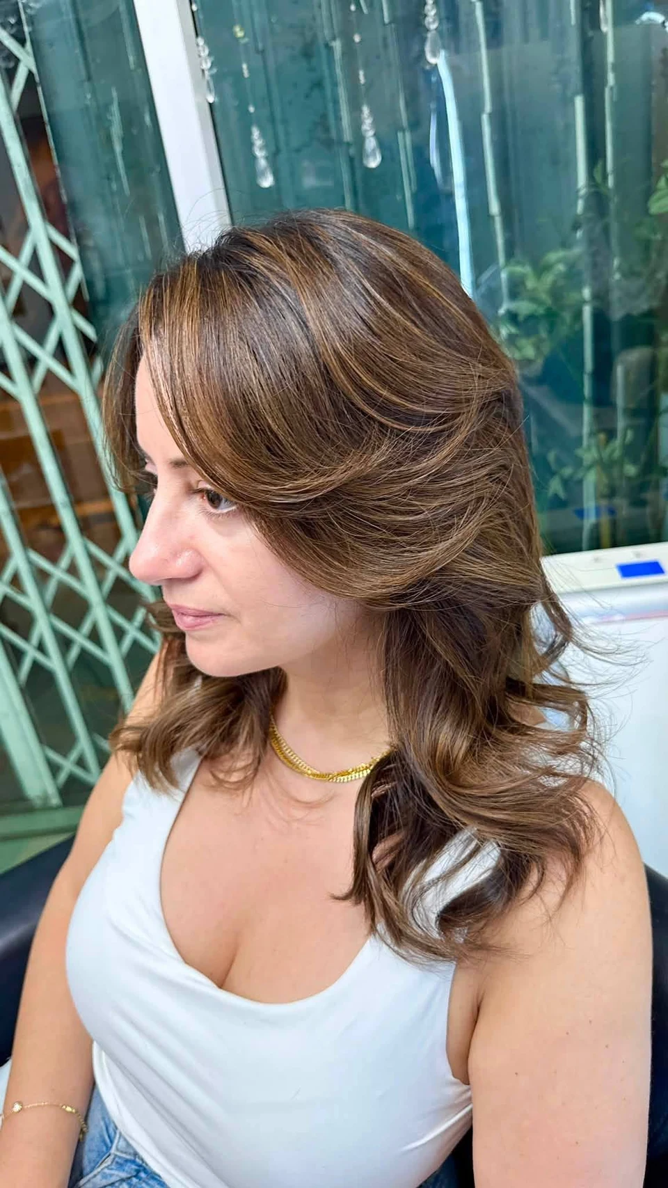 Warm honey brown Balayage with a smooth keratin finish at Oilly Hair Salon Bangkok