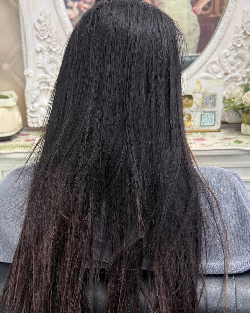 Back view before black-dyed hair color correction at Oilly Hair Salon Bangkok