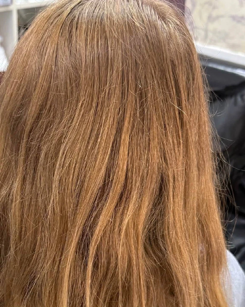 Before view of bright blonde mid-lengths and ends prior to no-bleach chocolate-blonde colour at Oilly Hair Salon Bangkok