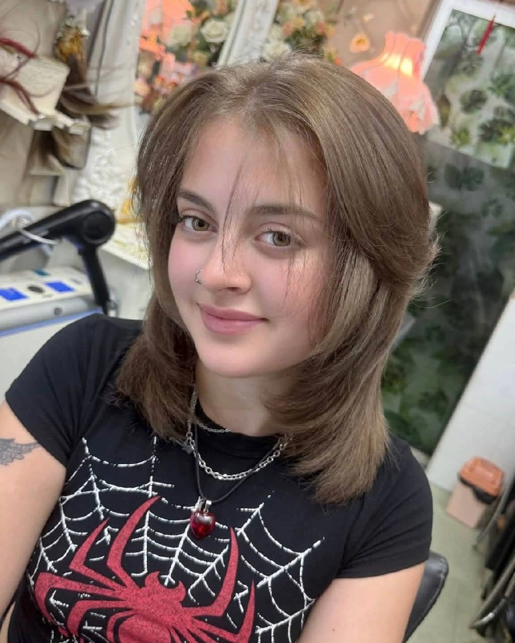 Front result of red hair color removal with natural root blending and face-framing layers at Oilly Hair Salon Bangkok