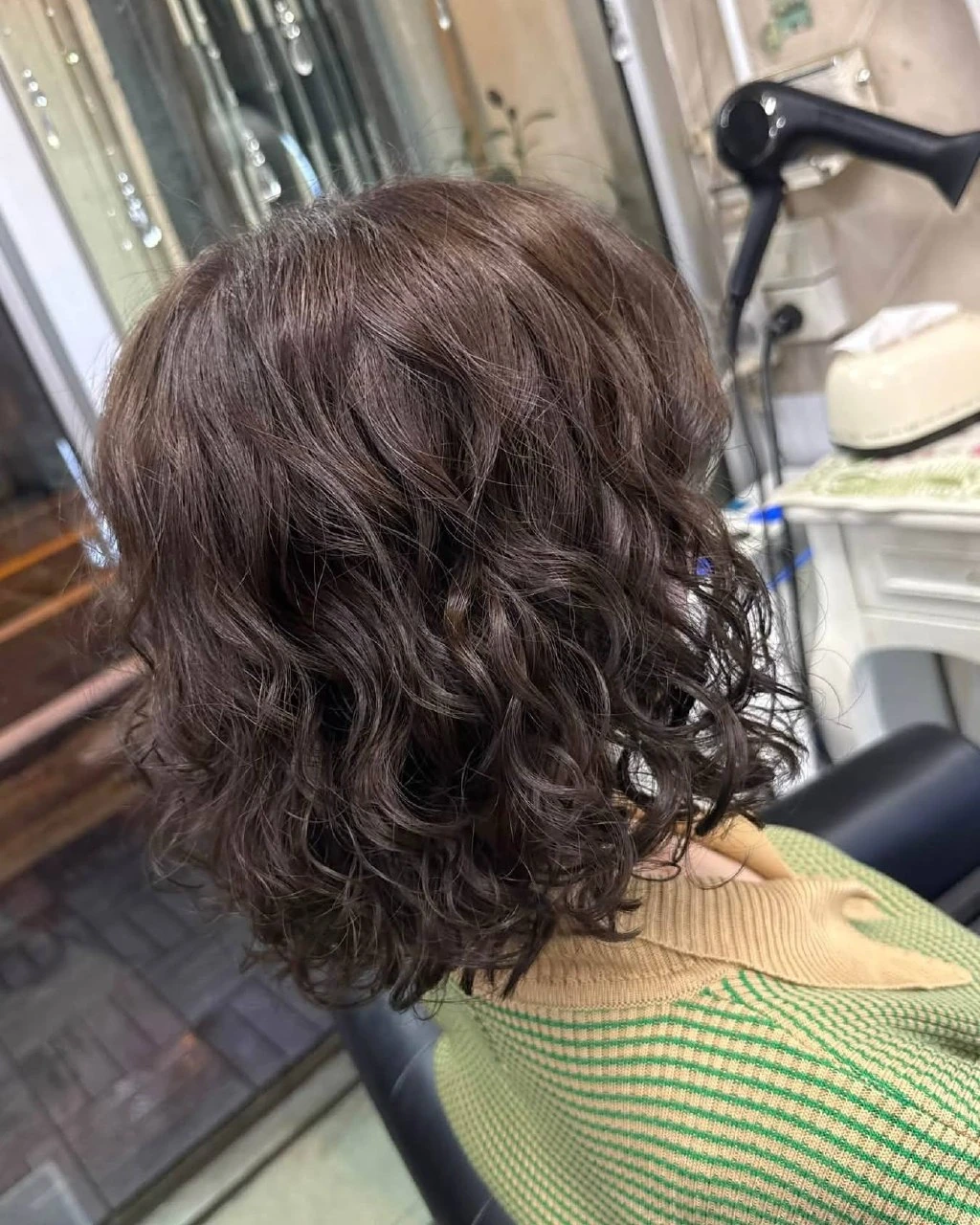 Korean S-wave digital perm in a soft muted brown on fine hair in Bangkok, back view